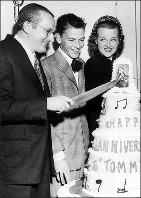 Tommy Dorsey Cuts Cake